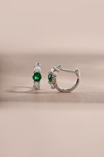 emerald three stone huggie hoop earring in sterling silver side view 
