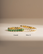 Sami Jewels emerald slanted baguette ring with white CZ baguette accents, showcasing elegant jewelry design.