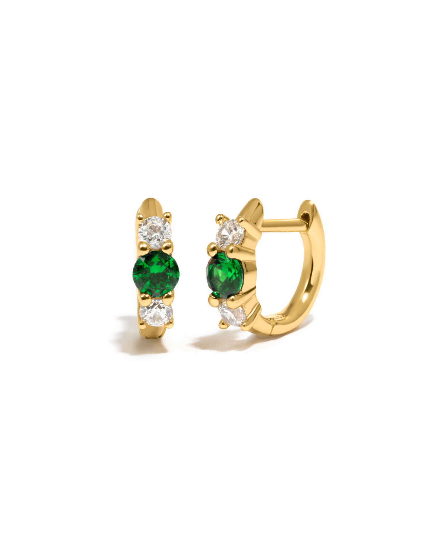 emerald three stone huggie hoop earring in gold 
