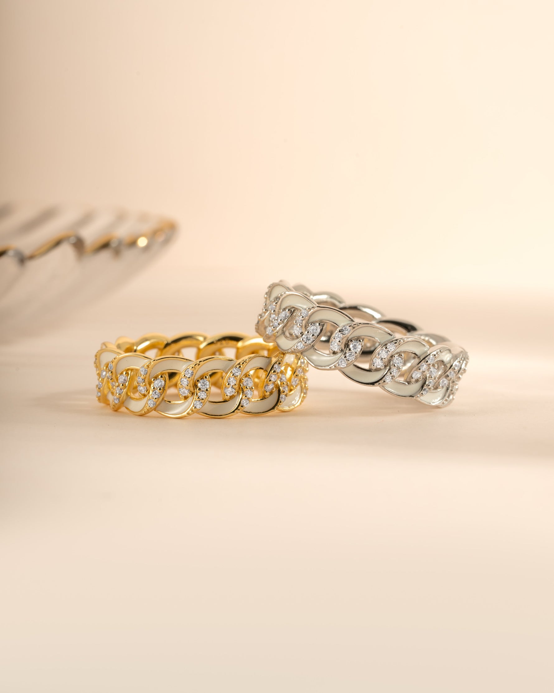 White enamel chain ring by Sami Jewels featuring gold and sterling silver links, showcasing a stylish and modern jewelry design.