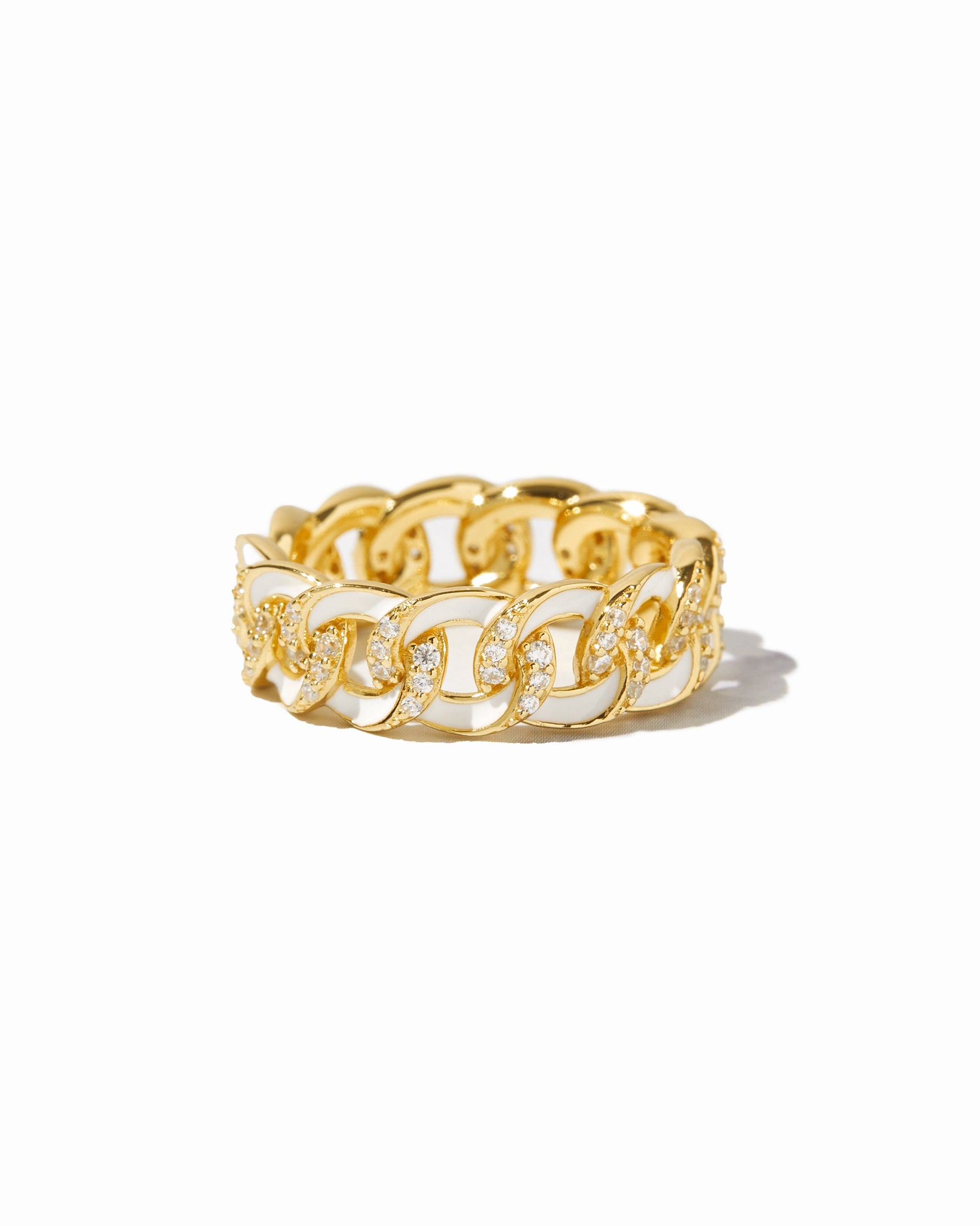 White enamel chain ring by Sami Jewels featuring a sleek gold-tone design on a plain white background.