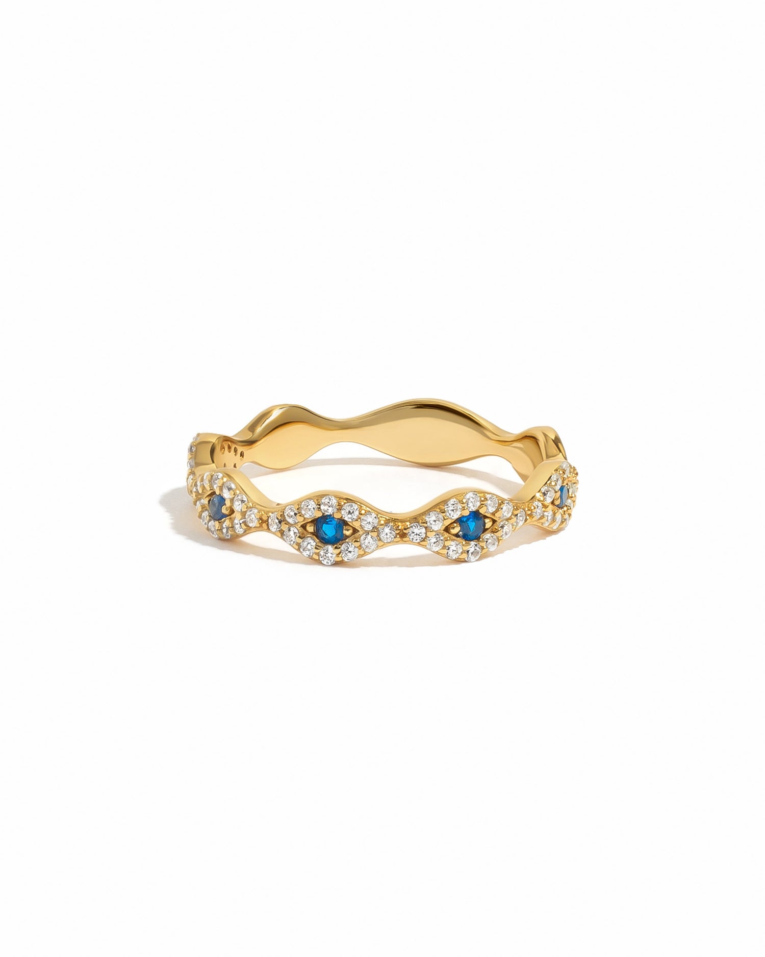 Gold evil eye ring from Sami Jewels featuring a detailed eye design on a white background.
