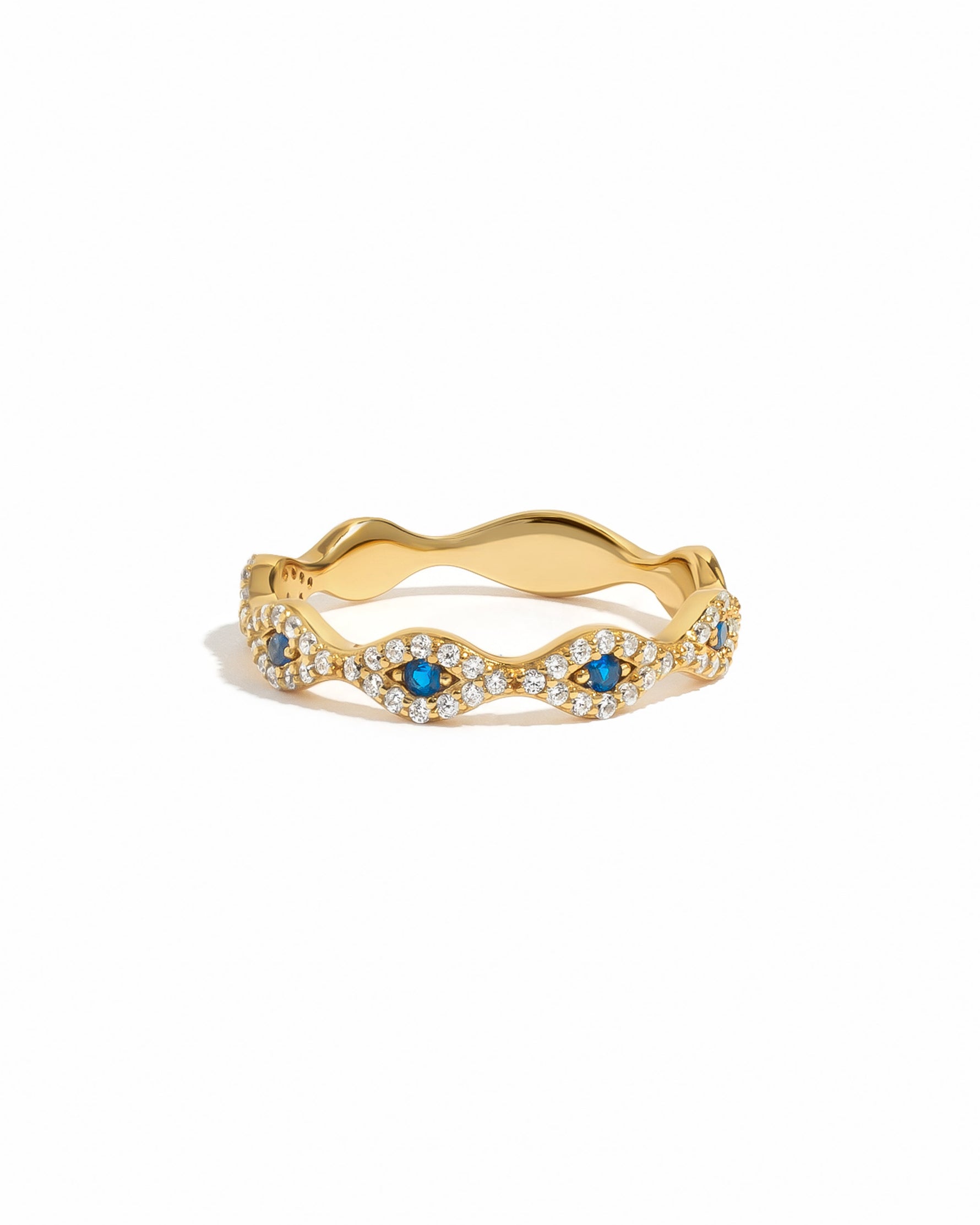 Gold evil eye ring from Sami Jewels featuring a protective eye design on a white background.