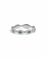Sterling silver evil eye ring from Sami Jewels featuring a detailed blue and white eye design on a plain white background.