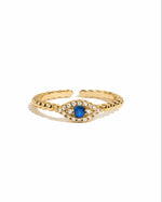 adjustable evil eye ring in gold on a white background