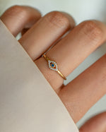 Tiny blue evil eye ring by Samijewels-527 featuring a gold band and detailed evil eye design, perfect for everyday jewelry.