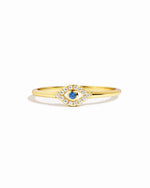 Tiny blue evil eye ring by Samijewels-527, featuring a gold band with a blue evil eye charm, shown against a white background.