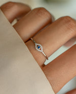 Sterling silver Tiny Blue Evil Eye Ring by Samijewels-527, showcasing a delicate evil eye design on a ring.