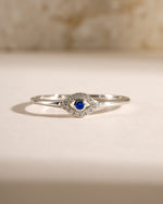 Tiny blue evil eye ring by Samijewels-527, sterling silver jewelry featuring a delicate evil eye design on a ring.