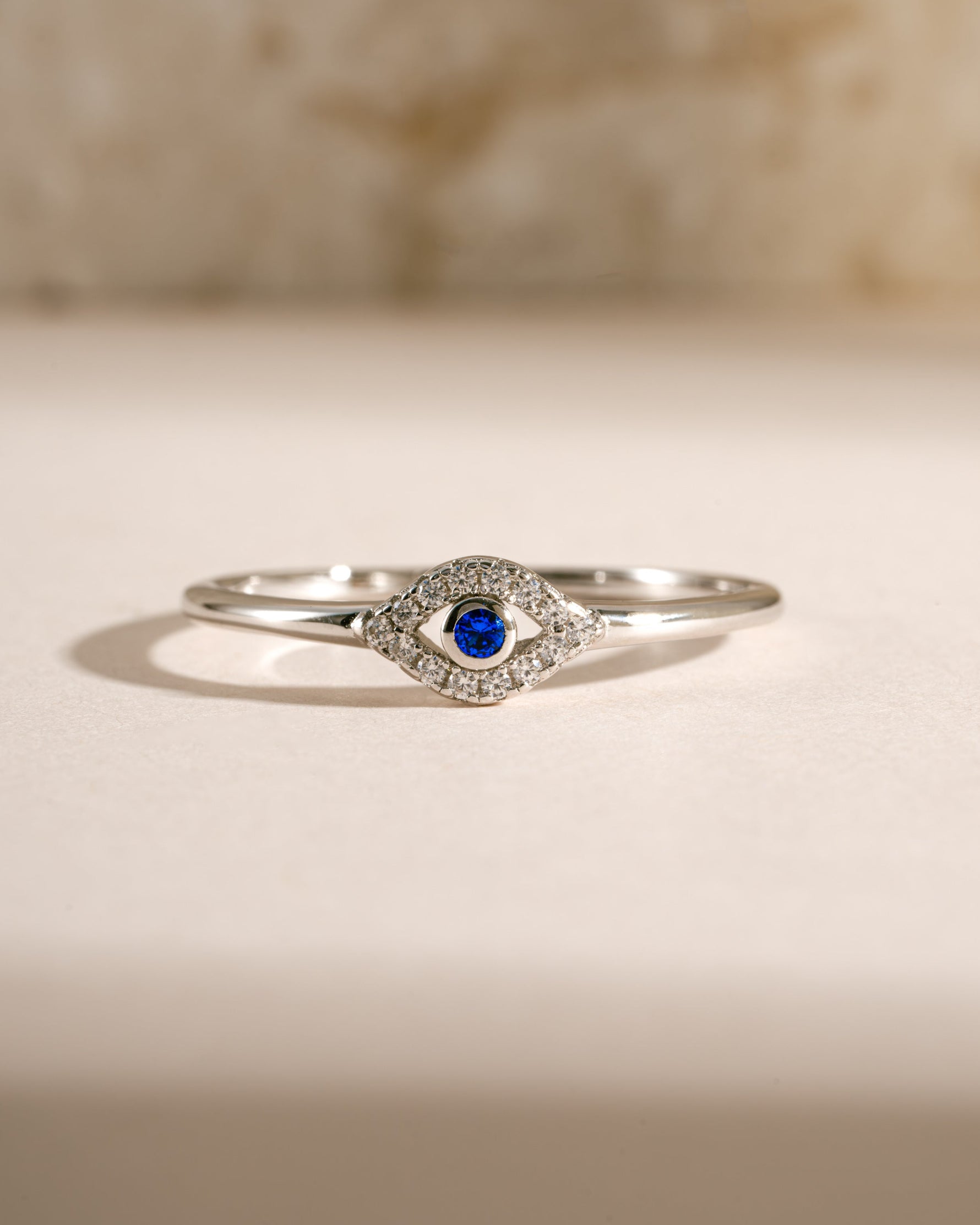 Tiny blue evil eye ring by Samijewels-527, sterling silver jewelry featuring a delicate evil eye design on a ring.