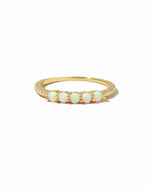 Gold 5-stone opal ring by Sami Jewels with vibrant, multicolored opal stones set in a sleek gold band.