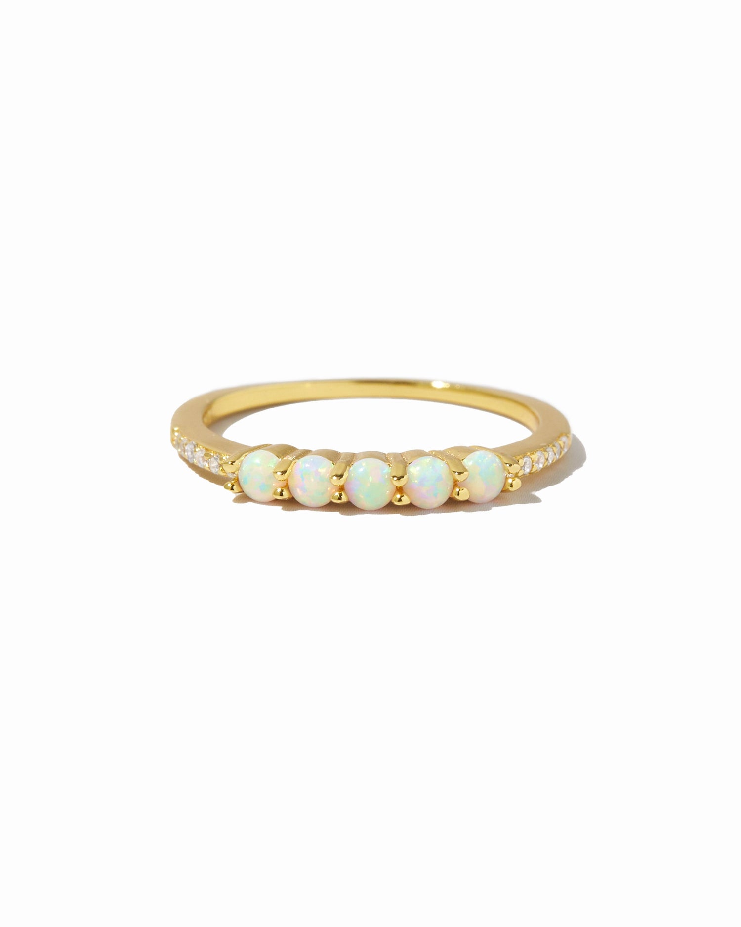 Gold five-stone opal ring from Samijewels-527 with colorful opal stones set in a sleek band, displayed on a white background.