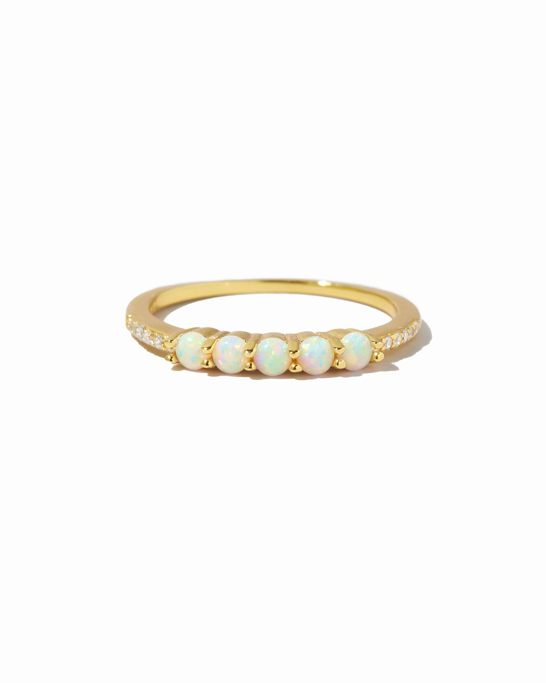 Gold 5-stone opal ring by Sami Jewels with vibrant, multicolored opal stones set in a sleek gold band.