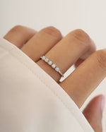 Sterling silver 5-stone opal ring by Sami Jewels showcasing vibrant opal gemstones on a sleek band.