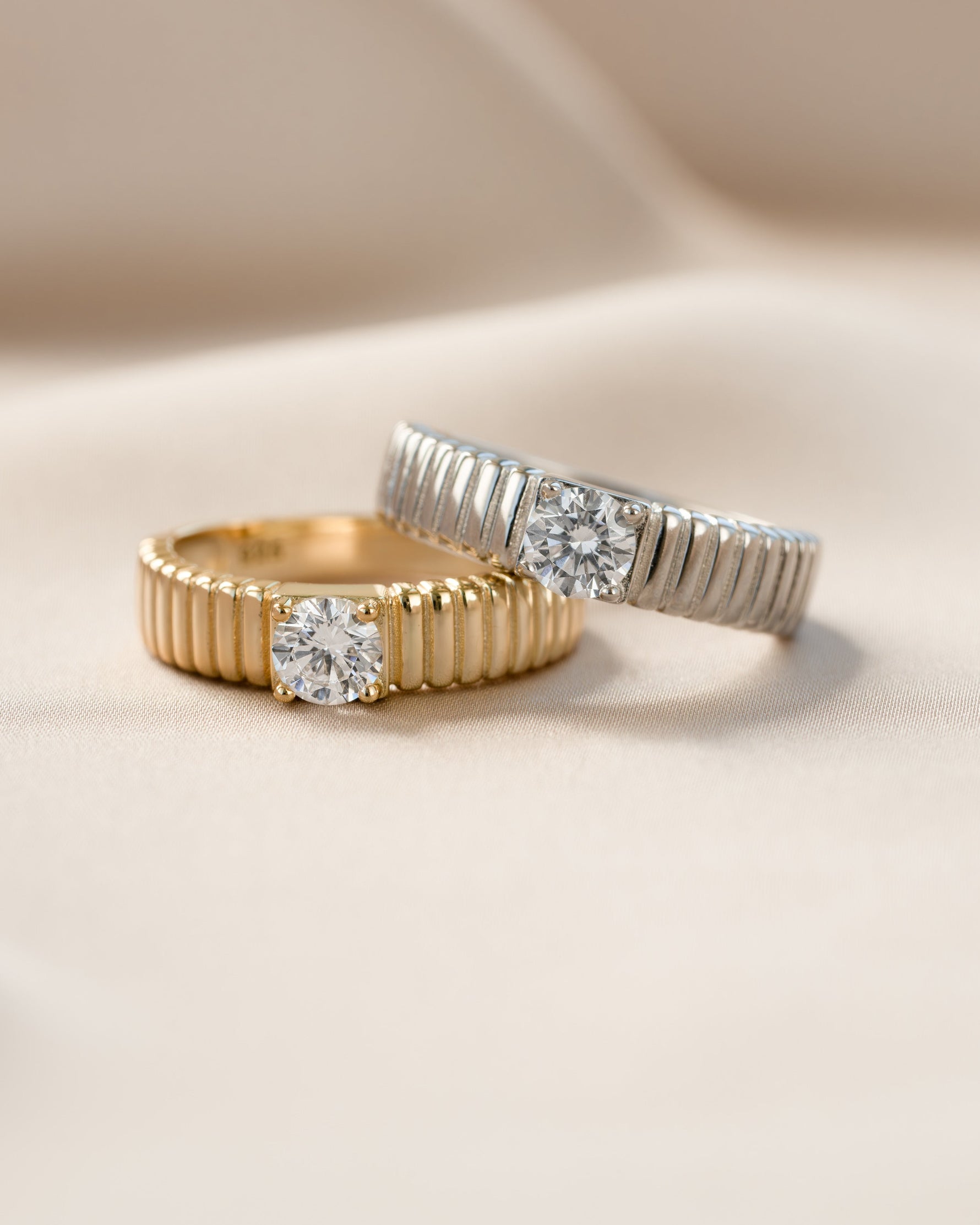 Gold and sterling silver fluted solitaire CZ ring from Sami Jewels featuring a central sparkling cubic zirconia stone.