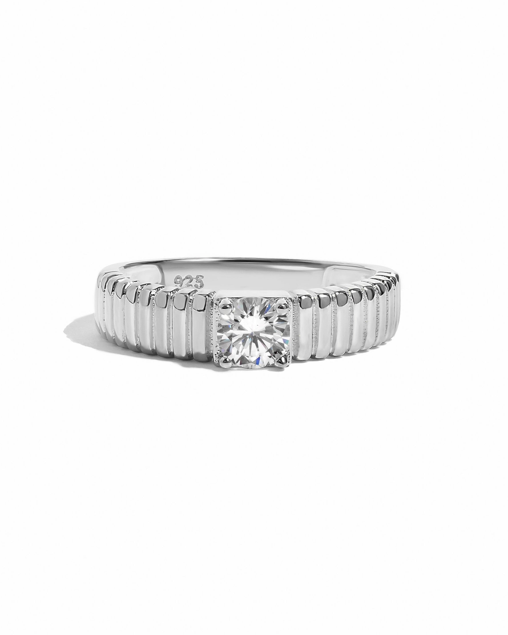 Sterling silver Fluted Solitaire CZ ring by Sami Jewels featuring a central cubic zirconia gemstone on a white background.