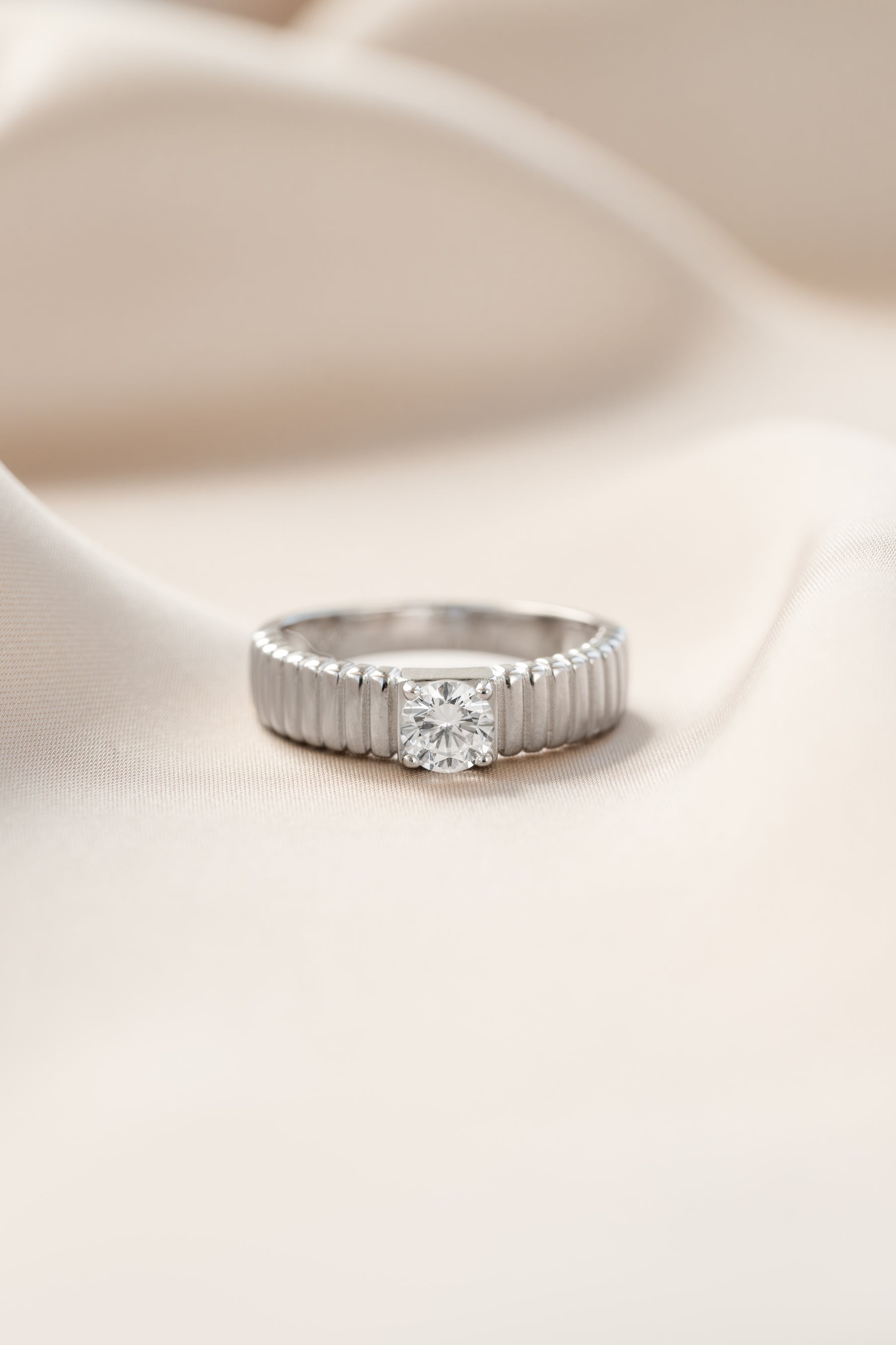 Sterling silver fluted solitaire CZ ring featuring a central cubic zirconia gemstone, crafted by Sami Jewels.