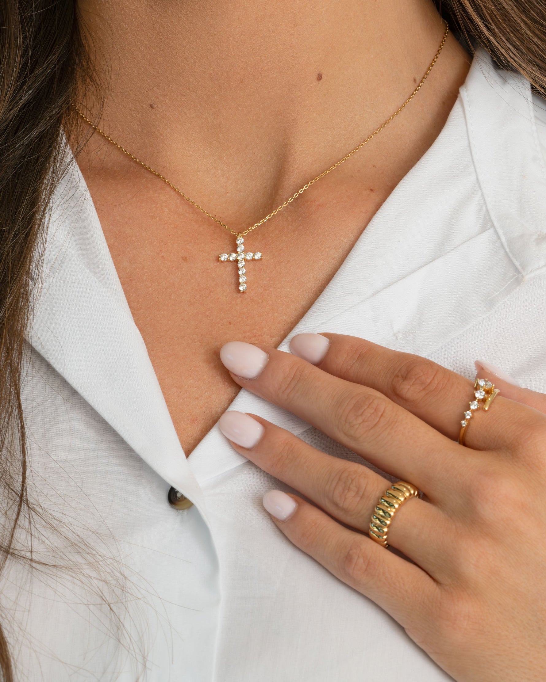 Gold fluted statement ring from Sami Jewels featuring a textured design, worn on a model's finger.