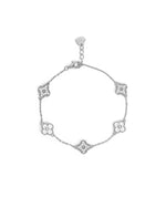 Sterling silver Sami Jewels bracelet featuring a four-leaf clover charm with diamond accents and rhodium plating.