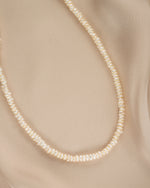 Close-up of a freshwater beaded pearl necklace by Sami Jewels, showcasing delicate pearls and intricate beading details.