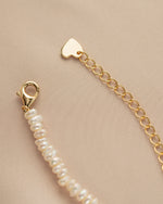 Freshwater beaded pearl necklace with a lobster clasp from Sami Jewels, featuring lustrous pearls on a delicate strand.