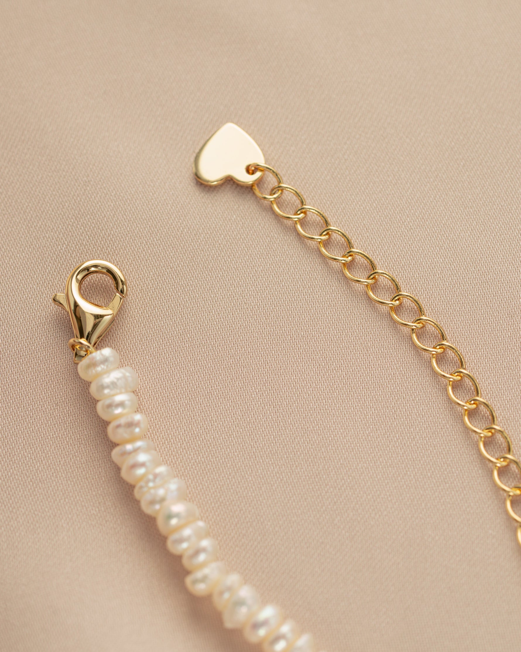 Freshwater beaded pearl necklace with a lobster clasp from Sami Jewels, featuring lustrous pearls on a delicate strand.