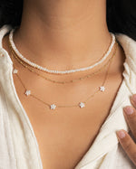 Freshwater beaded pearl necklace by Sami Jewels featuring a string of lustrous pearls on a delicate chain.