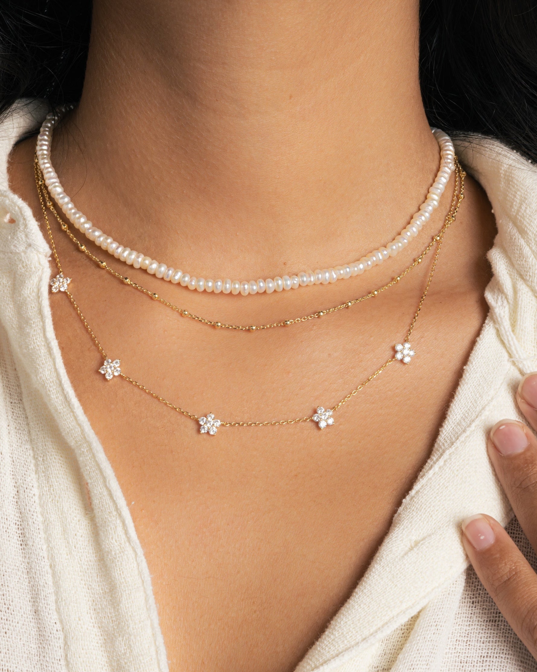 Freshwater beaded pearl necklace by Sami Jewels featuring a string of lustrous pearls on a delicate chain.