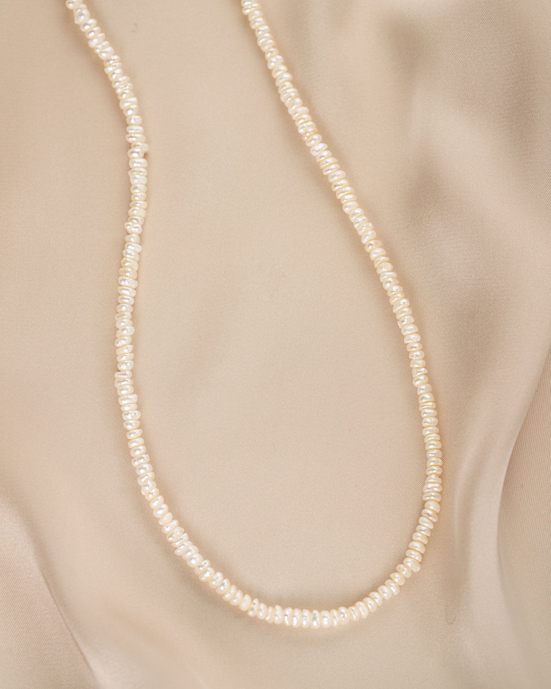Freshwater beaded pearl necklace from Sami Jewels featuring multiple lustrous pearls on a delicate strand.