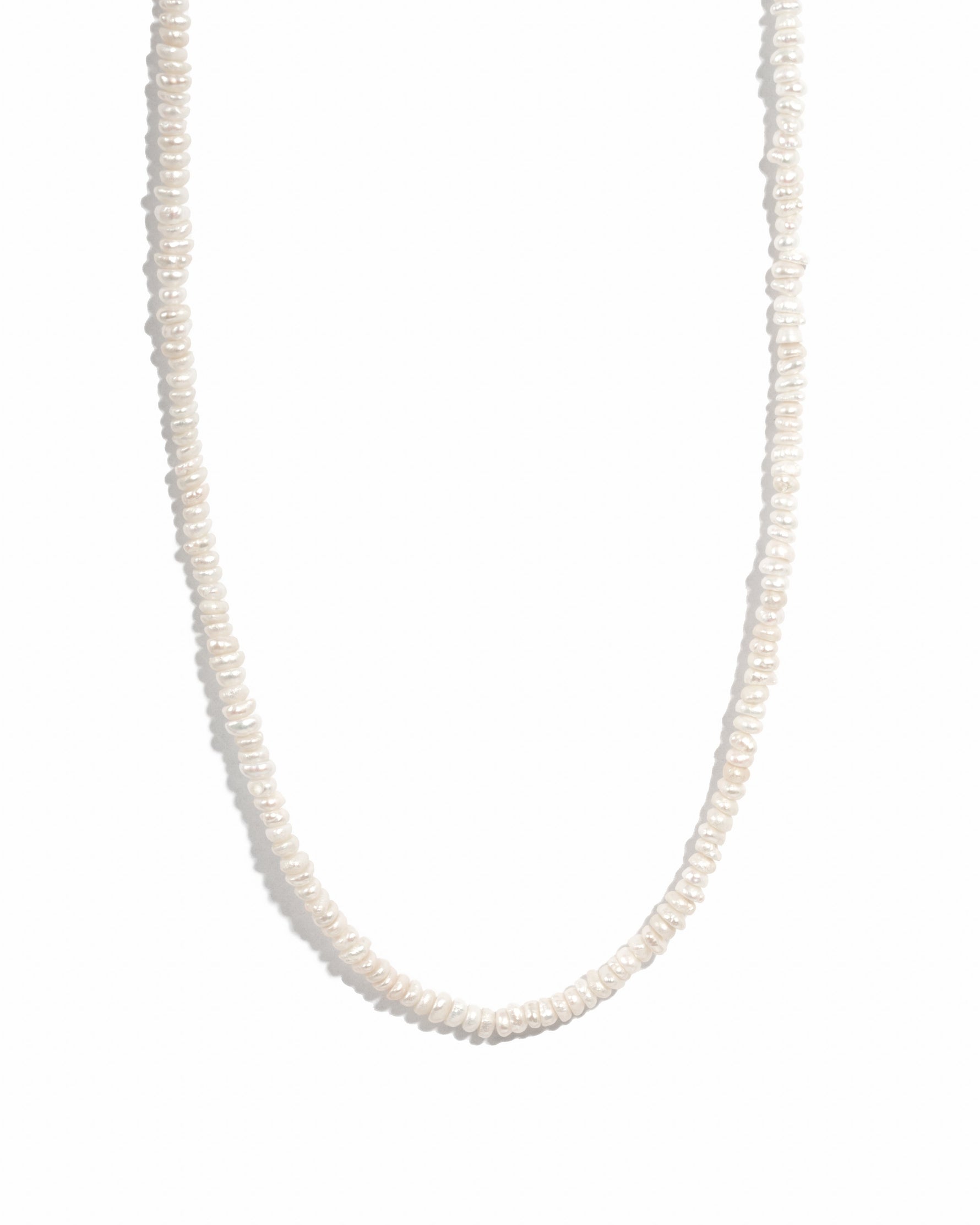 Freshwater beaded pearl necklace by Sami Jewels featuring white pearls on a delicate strand, elegant jewelry for special occasions.