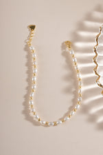 Freshwater pearl beaded bracelet by Sami Jewels featuring a gold lobster clasp closure.