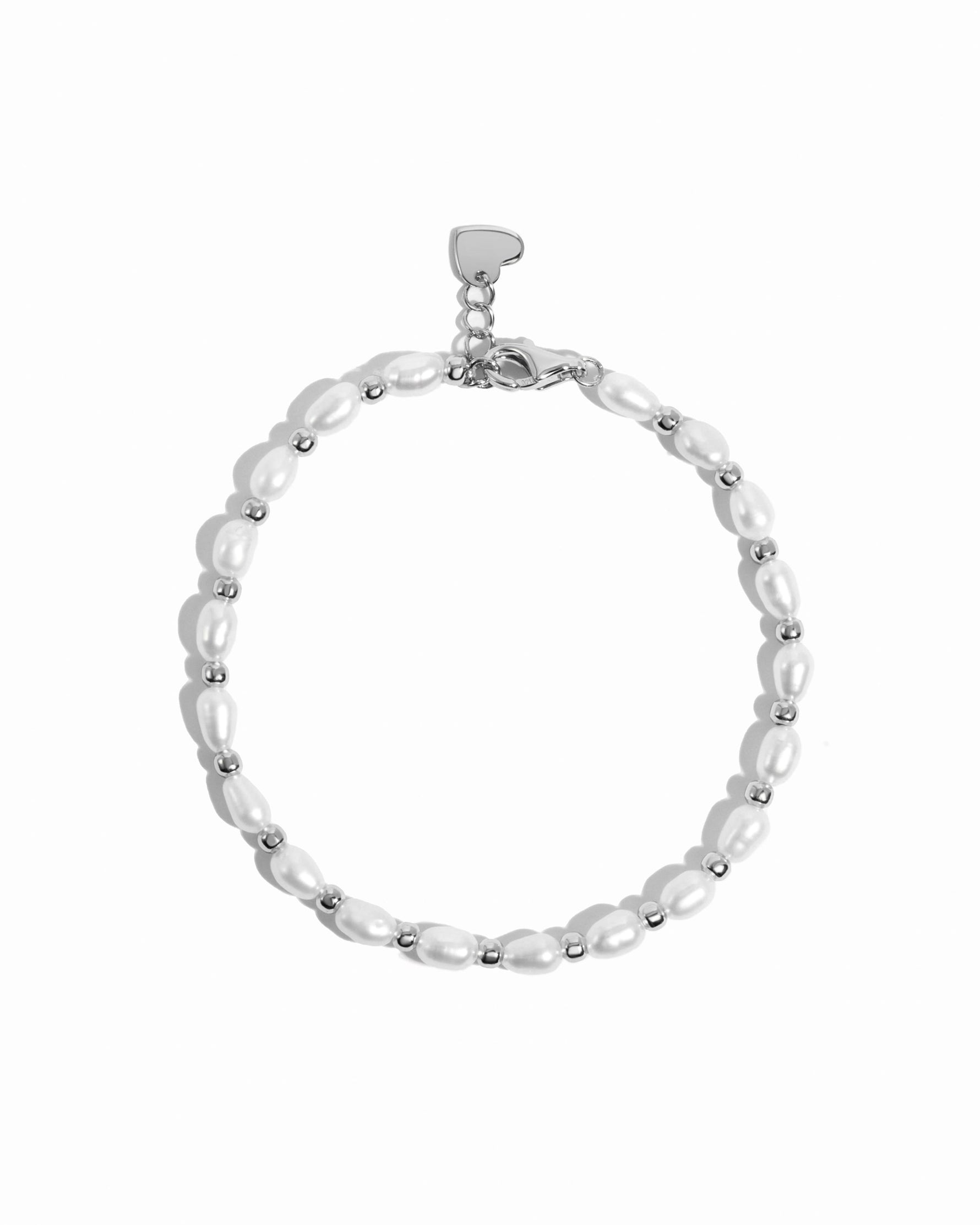 Freshwater pearl beaded bracelet by Sami Jewels featuring white pearls on a sterling silver chain, displayed against a white background.