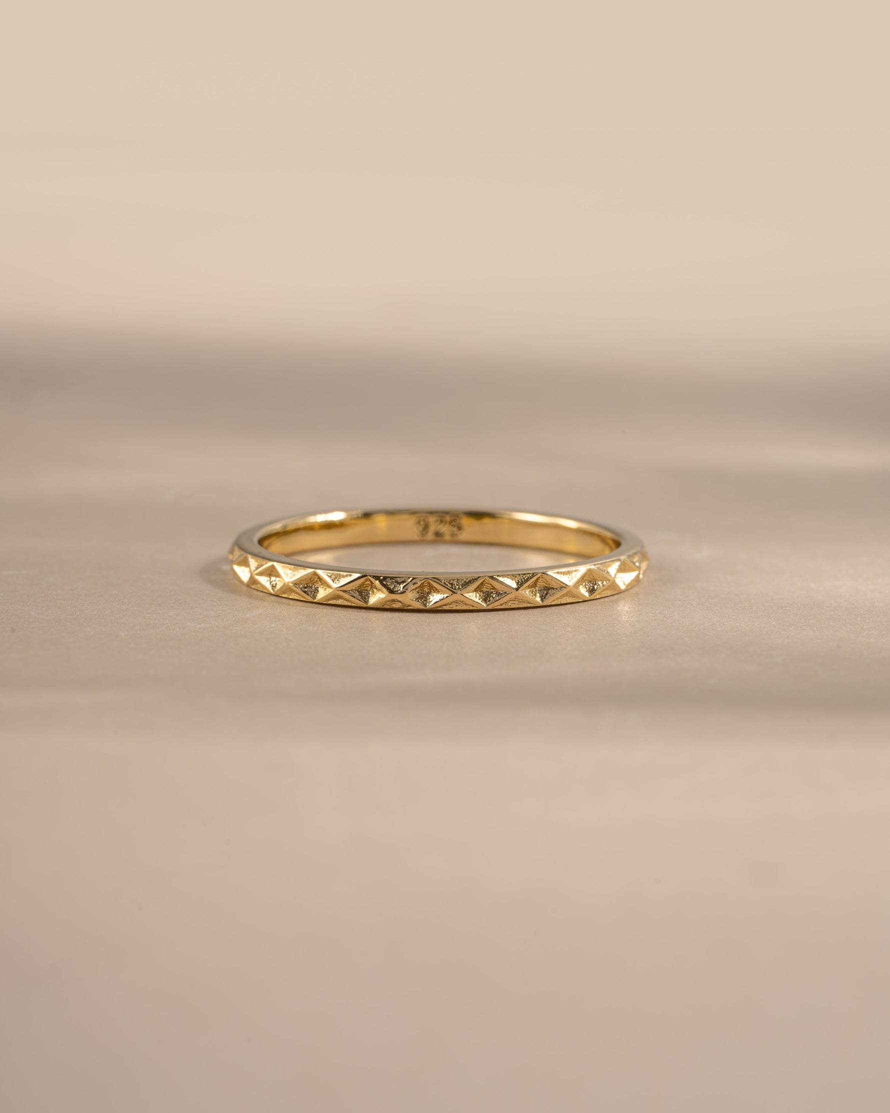 geometric stacking ring in gold closeup view 