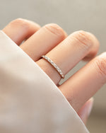 geometric stacking ring in sterling silver worn on models hand 