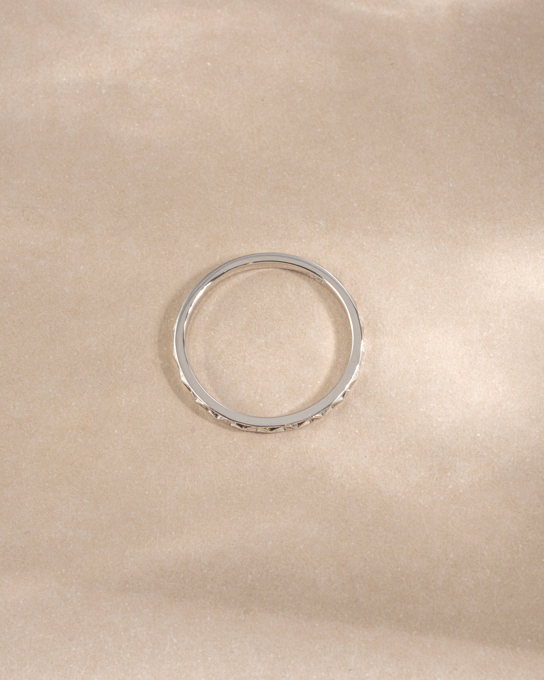 geometric stacking ring in sterling silver on neutral background 