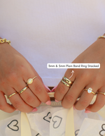 Stacked gold 5mm plain band ring from Sami Jewels, featuring a simple, smooth design perfect for everyday wear.