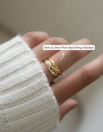 Gold 5mm plain band ring from Sami Jewels, showcasing a smooth, polished design for stacking or everyday wear.