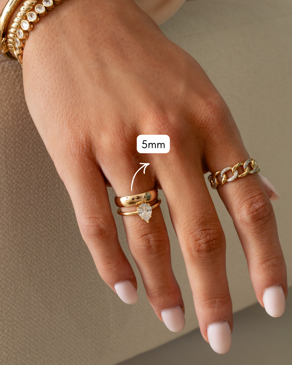 Gold 5mm plain band ring from Sami Jewels, showing a simple, smooth gold ring ideal for stacking or everyday wear.