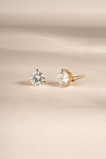 gold round solitaire diamond stud earrings close uo