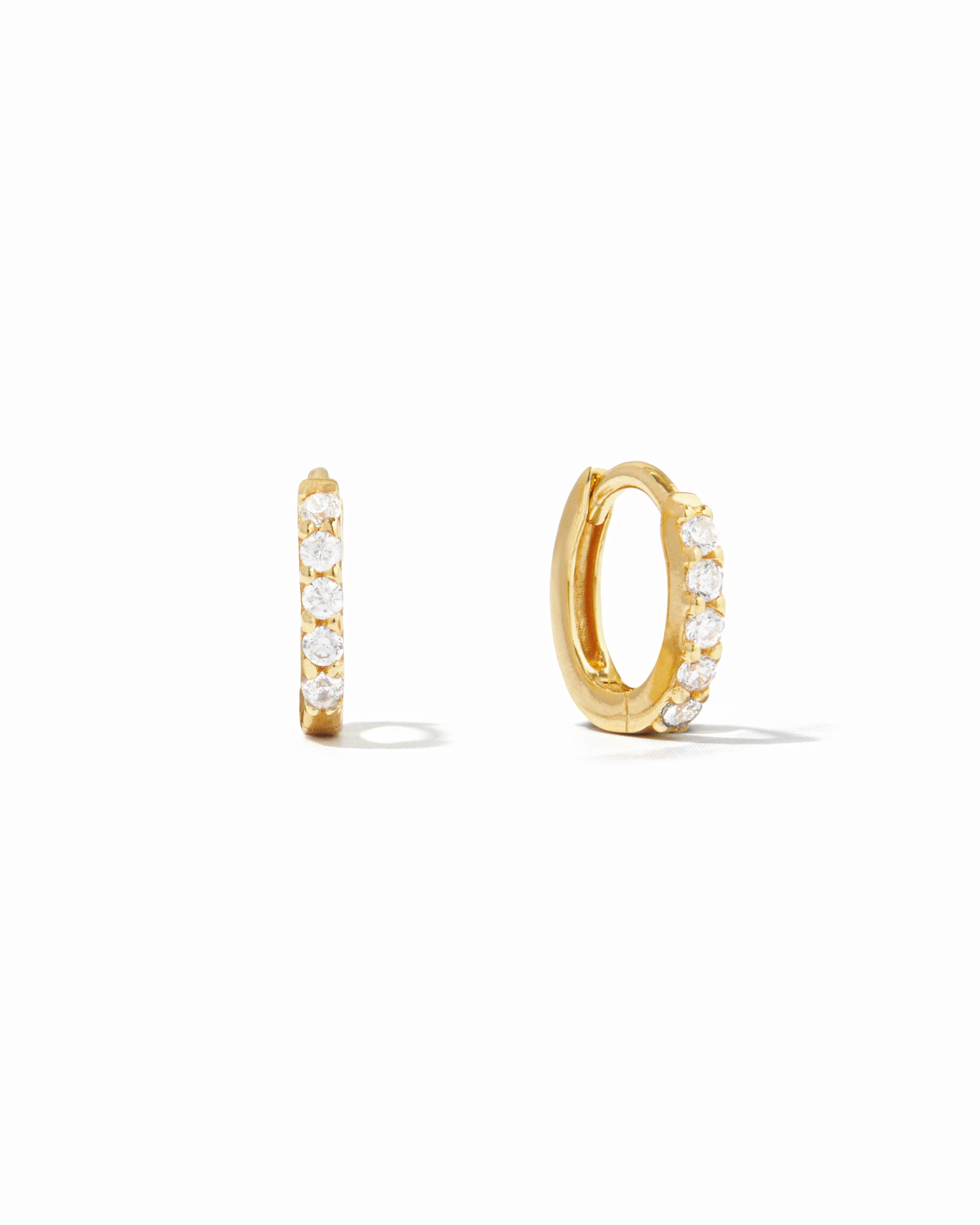 gold 7mm diamond huggie hoop earring white background