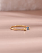 gold aquamarine baguette diamond ring side view