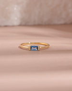 gold aquamarine baguette diamond ring front view