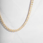Close Up shot of gold dainty diamond necklace from Sami Jewels