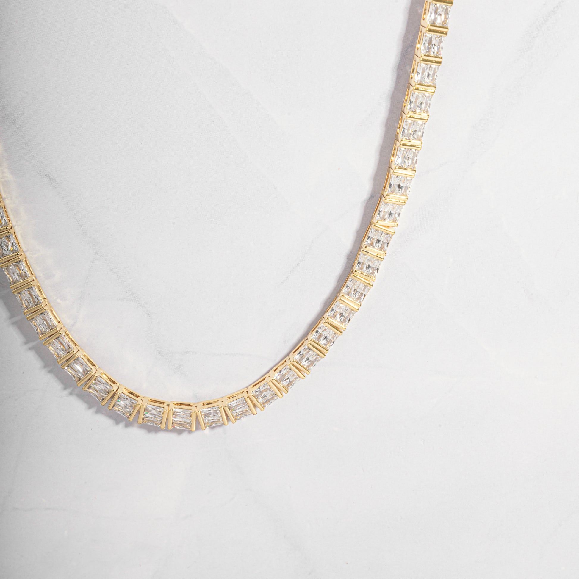 Close Up shot of gold dainty diamond necklace from Sami Jewels