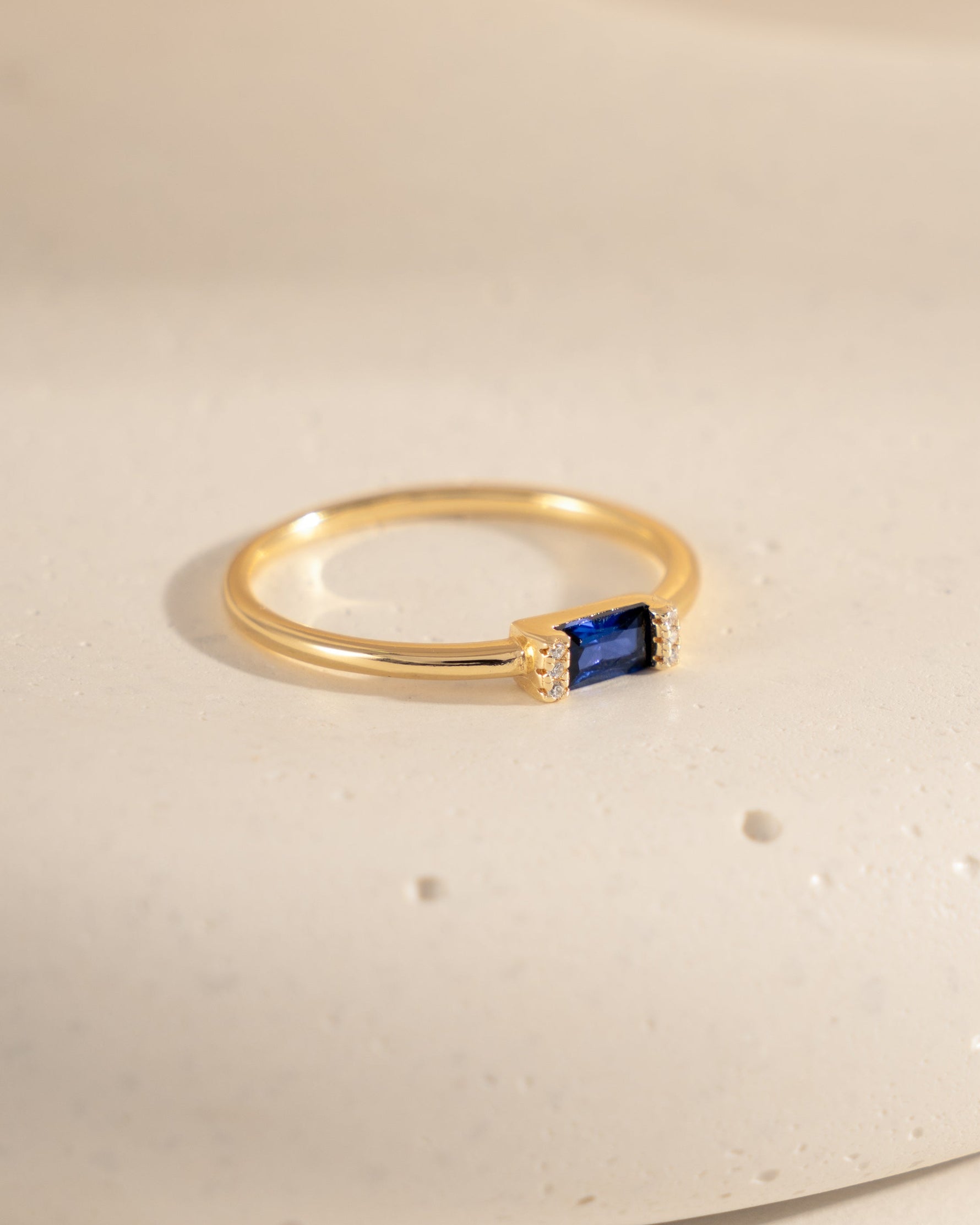 gold sapphire baguette ring side view