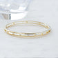 gold bangle bracelet with cz stones