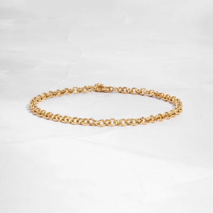 14K Gold Rolo Chain Bracelet on white background