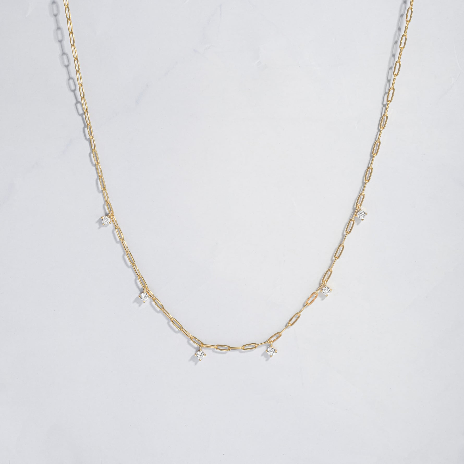 gold paperclip chain with diamond charms