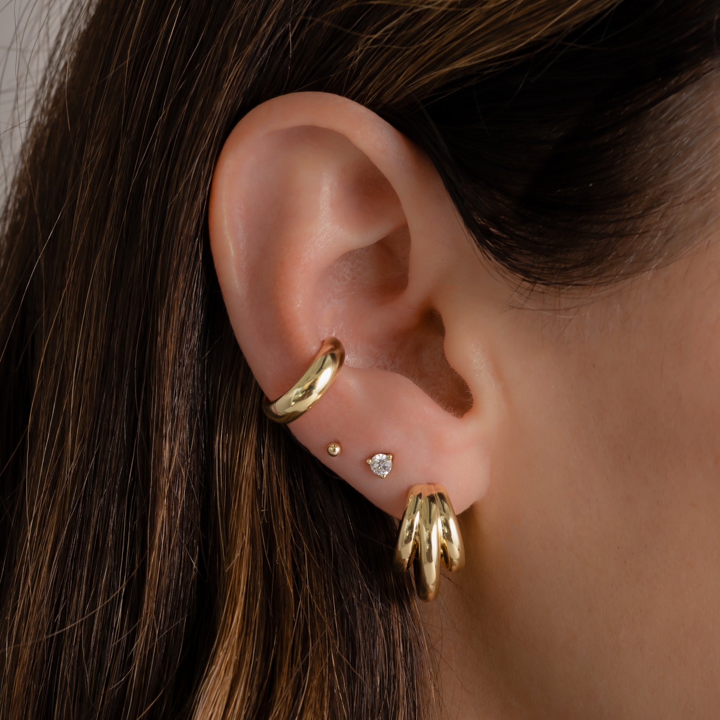 gold chunky ear cuff stacked earrings with triple hoops