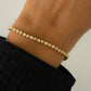 Round cut moissanite tennis bracelet worn on female model